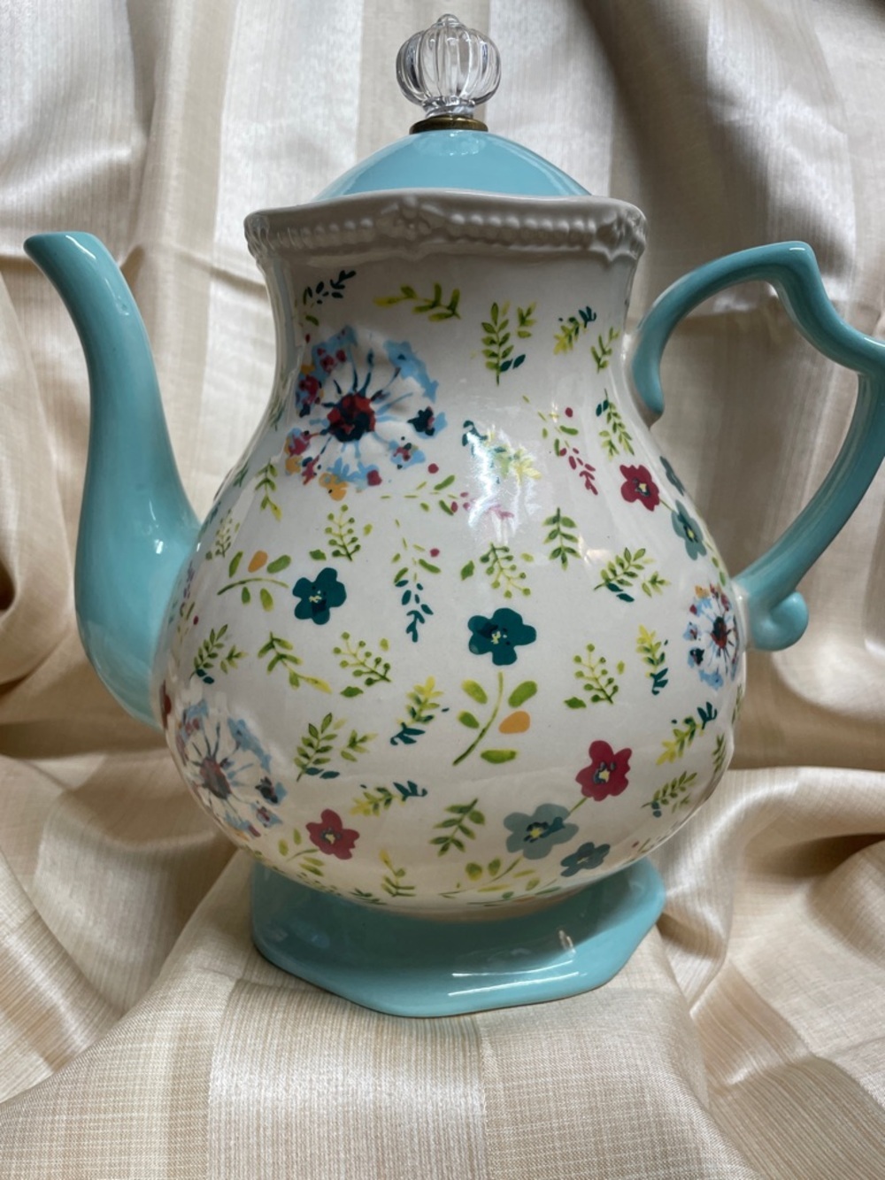 The Pioneer Woman Floral Ceramic Teapot in Multicolor with Plastic Bag Holder
